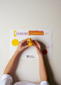 Flinders student making duck blocks