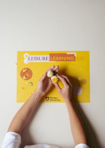 Flinders Student makes seed balls 